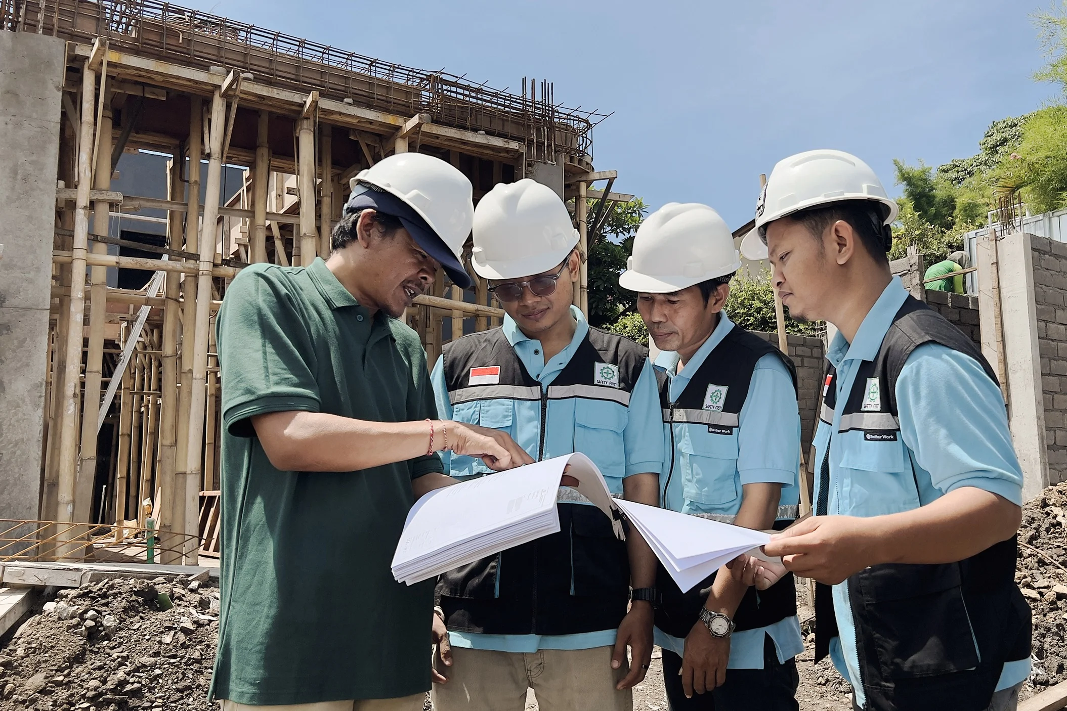 Construction, construction workers, meeting on the site